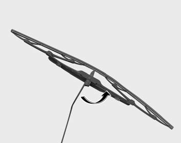 Kia Carnival: Blade replacement. 1. Raise the wiper arm and turn the wiper blade assembly to expose the plastic