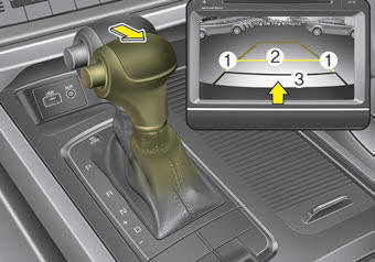 Kia Carnival: Rearview camera. The rearview camera will activate with the ignition switch ON and the shift lever