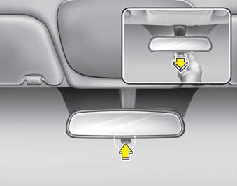 Kia Carnival: Inside rearview mirror. Make this adjustment before you start driving and while the day/night lever is